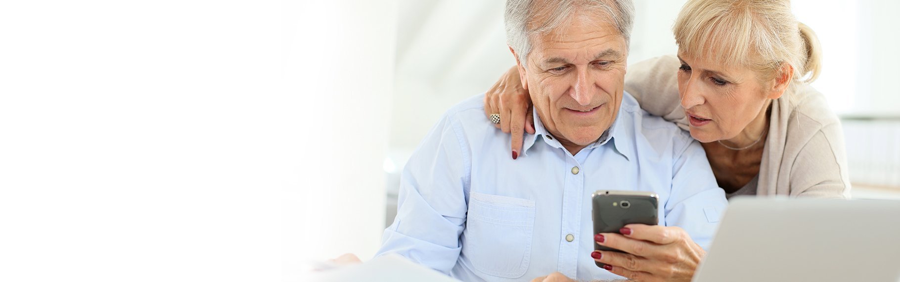 Older couple with device